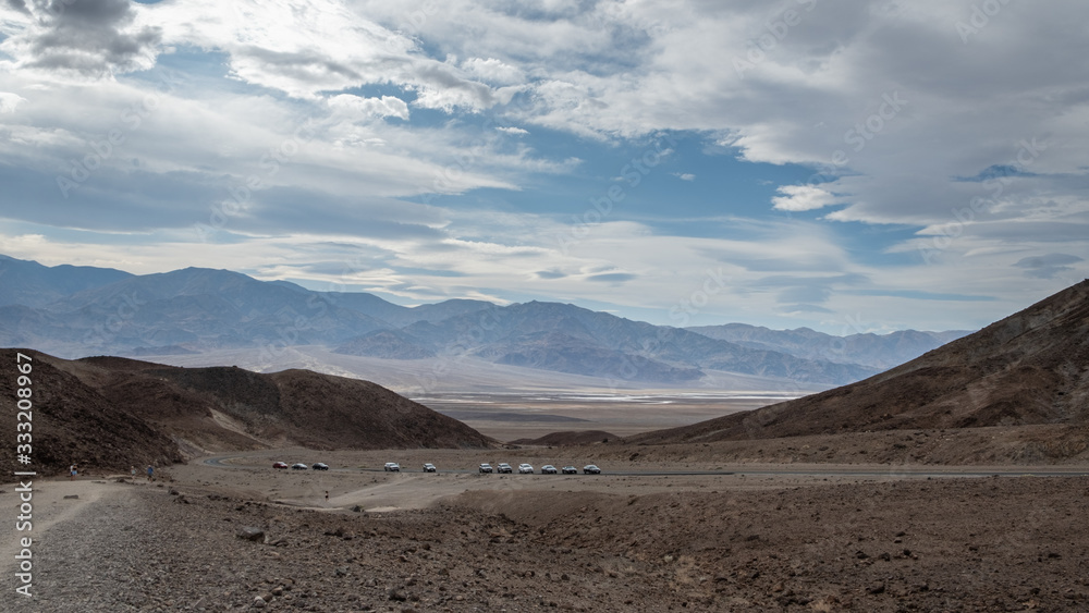 cars in the middle of the death valley desert, california