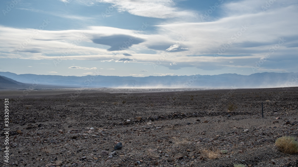 dry desert of death valley with cloud sky