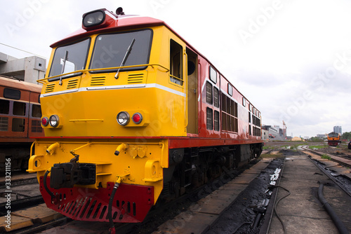 Electric diesel locomotive Is waiting for the signal to leave the station