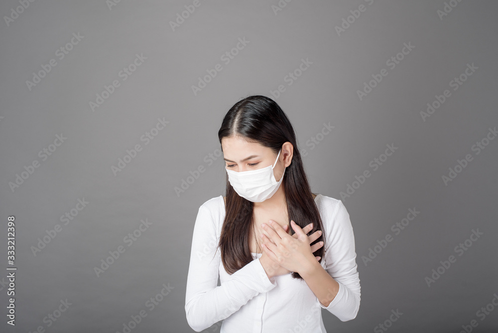 Portrait of woman with surgical mask in studio, Health care concept Portrait of woman with surgical mask in studio, Health care concept