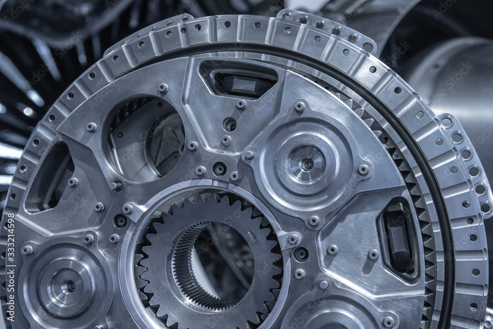 Jet engine gear wheels, industrial background. Jet engine gear wheels, industrial background.