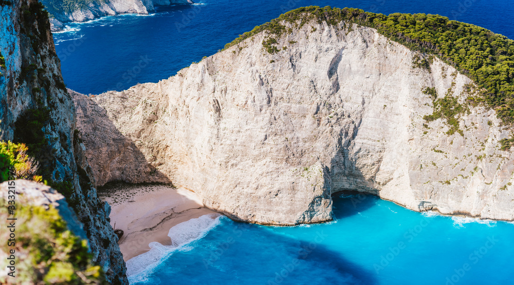 Obraz premium Close up of Navagio beach, Zakynthos island, Greece. Shipwreck bay with turquoise water and white sand beach. Famous landmark location in Greece