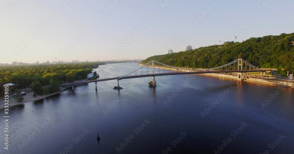 View on pedestrian bridge across the Dnieper river in Kiev, Ukraine. View on pedestrian bridge across the Dnieper river in Kiev, Ukraine.