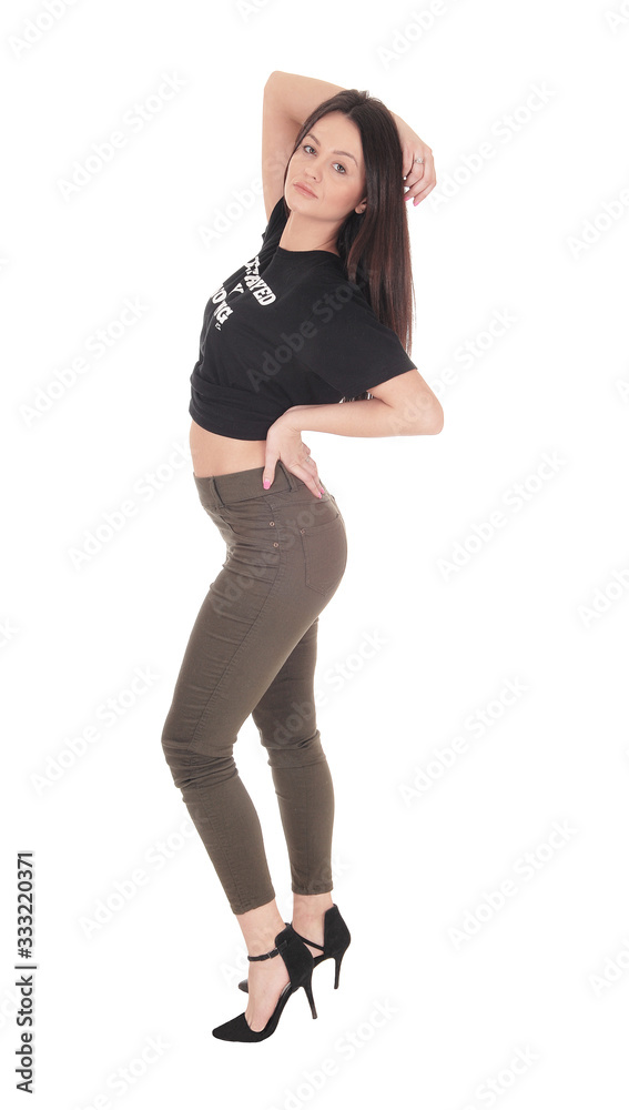 Lovely woman standing in profile bending backwards Lovely woman standing in profile bending backwards