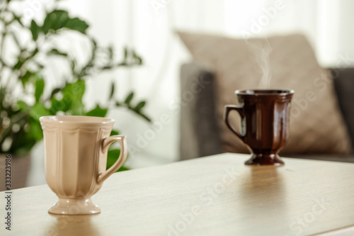 Desk of free space and blurred background of window 