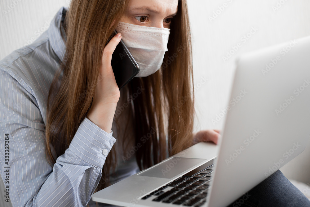 A white girl is working from home during Coronavirus or Covid-19 quarantine, coronavirus covid 19 infected patient in coronavirus covid 19 quarantine room using computer A white girl is working from home during Coronavirus or Covid-19 quarantine, coronavirus covid 19 infected patient in coronavirus covid 19 quarantine room using computer