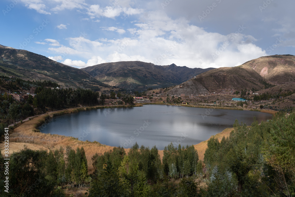  lagoon with mountains around it