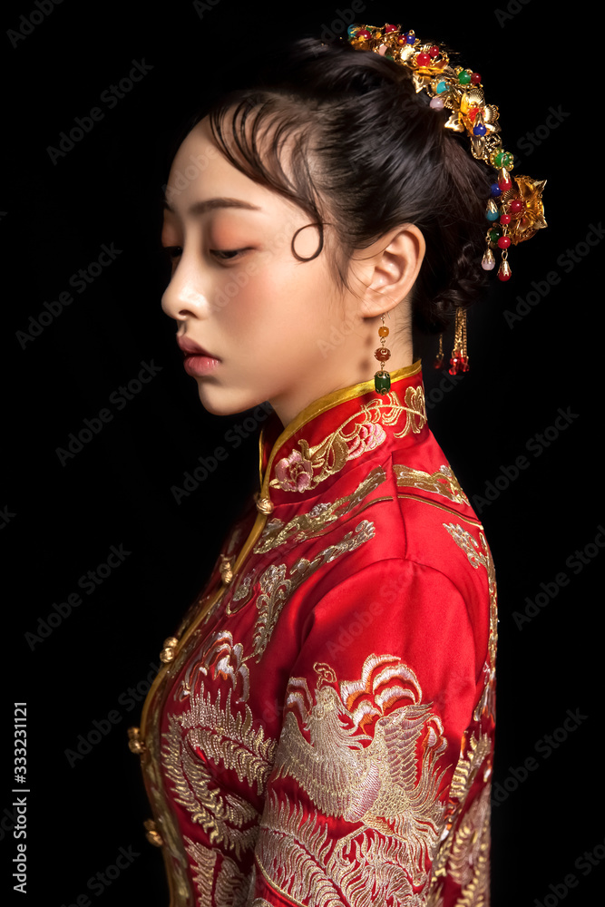 Asian girls wearing ancient clothes on black background Asian girls wearing ancient clothes on black background