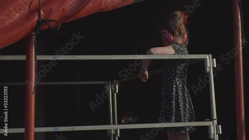 Little girl at music festival photo