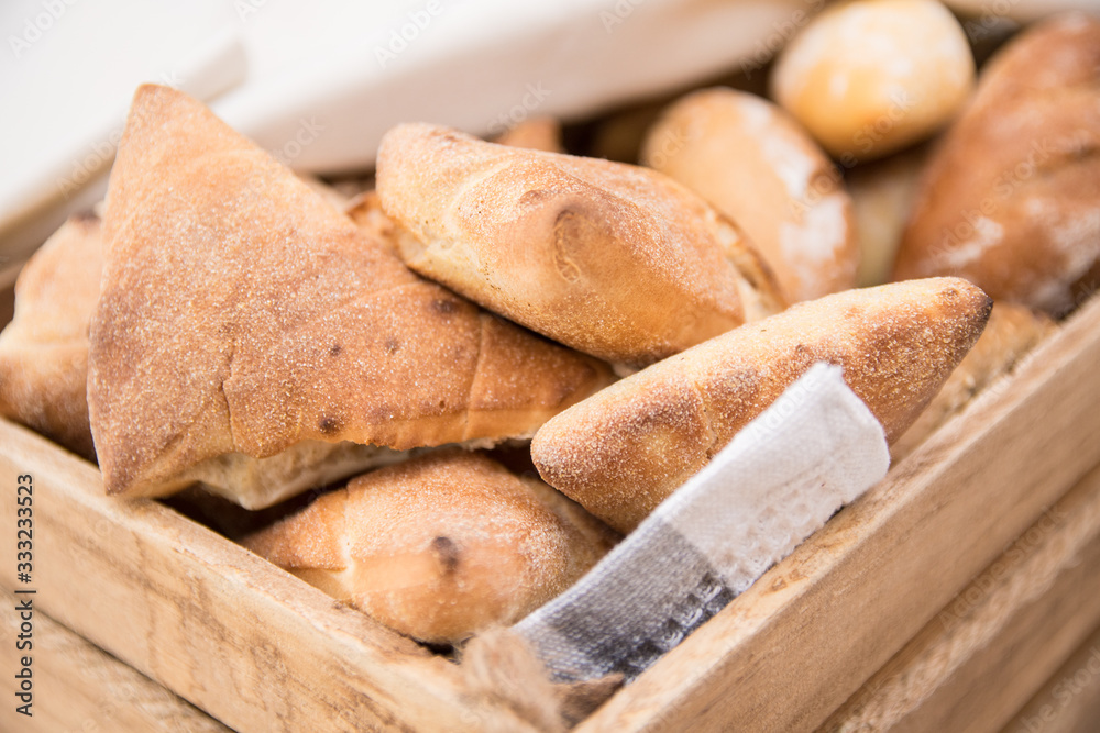 Variety of fresh bread in a basket. Food concept.
