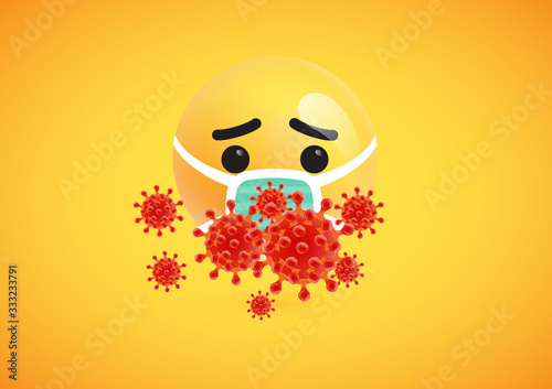 Yellow emoticon with medical mask and coronaviruses around, vector illustration