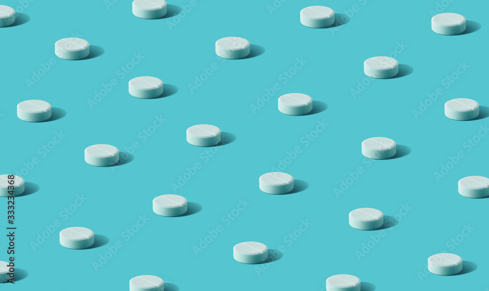 Flat lay of white round pills