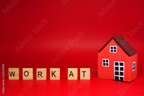 Work at home word object with House on red background - technology trend work anywhere or from home ,  prevention of covid-19 virus concept ,Ask for cooperation from everyone, must help each other