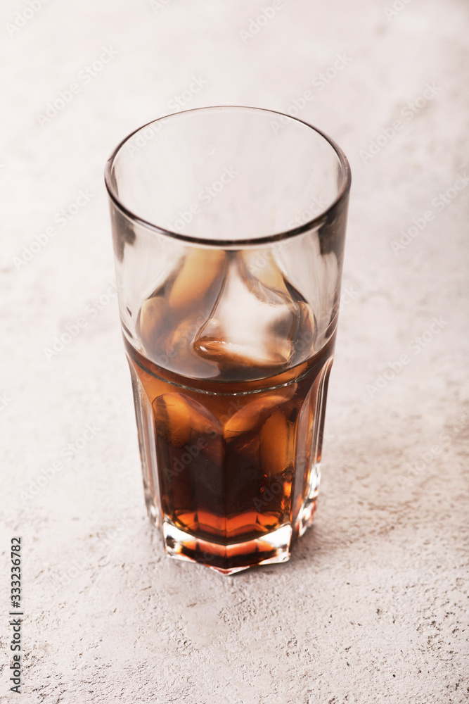 cola in a glass with ice cola in a glass with ice
