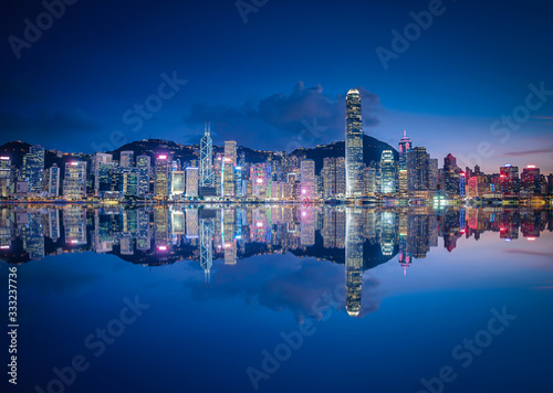 Photography Skyline Hong Kong city at twilight time view from harbor in Hong Kong