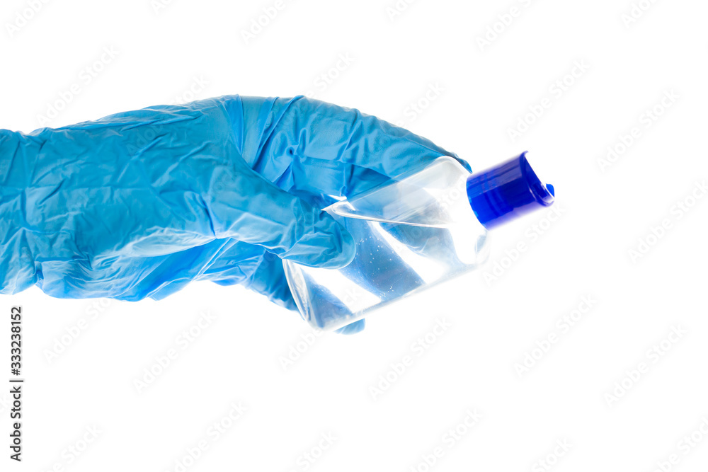 Close up of hand with medical gloves and sanitizer, desinfection against coronavirus, protection against virus