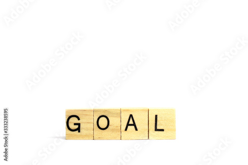 Goal word wooden object isolated white background and copy space - aim and destination concept
