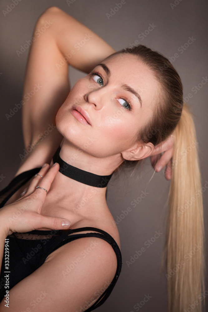 Fototapeta premium Portrait of a young sexy girl with long hare . The concept of hair care.
