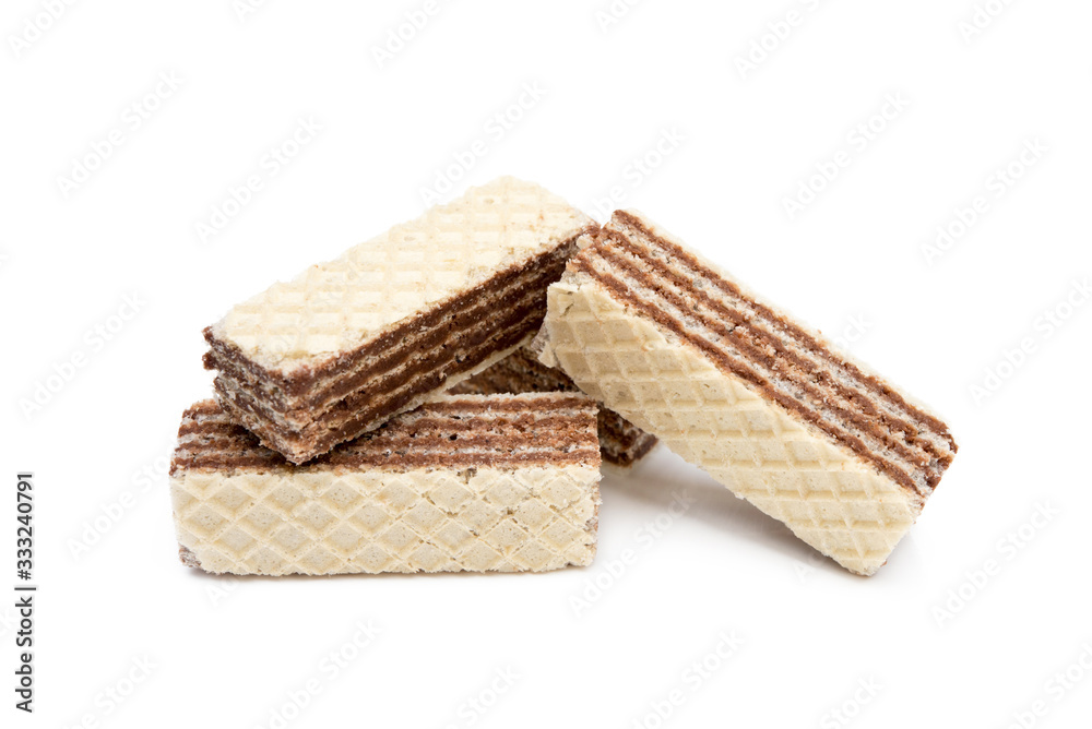 Crispy wafers with creamy hazelnut filling isolated on white background Crispy wafers with creamy hazelnut filling isolated on white background