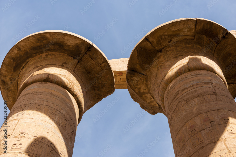 Ancient ruins of the Karnak Temple in Luxor (Thebes), Egypt. The largest temple complex of antiquity in the world. UNESCO World Heritage. Ancient ruins of the Karnak Temple in Luxor (Thebes), Egypt. The largest temple complex of antiquity in the world. UNESCO World Heritage.