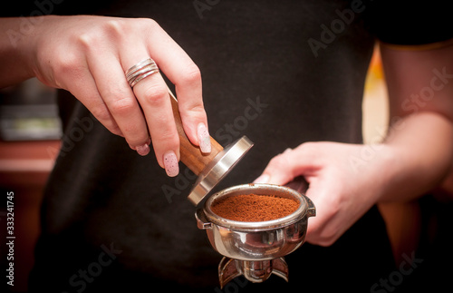 Barista prepares coffee