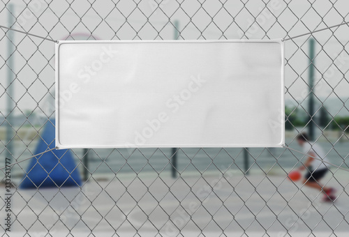 Blank Indoor outdoor Fabric Vinyl Banner hanging on the fence. 3d illustration. photo