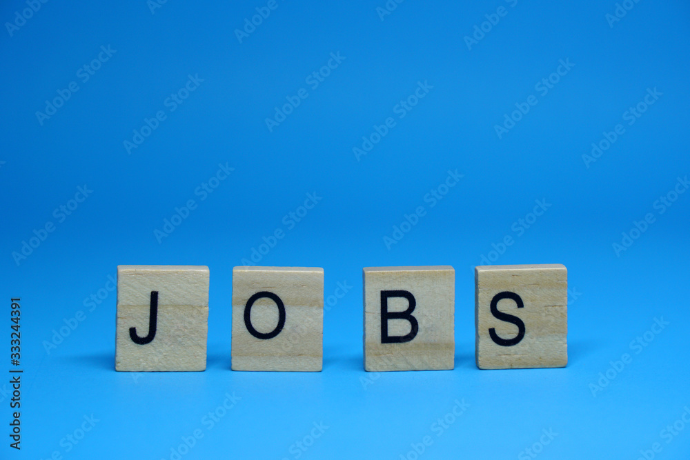 Jobs word object isolated blue background and copy space - work , business concept Jobs word object isolated blue background and copy space - work , business concept