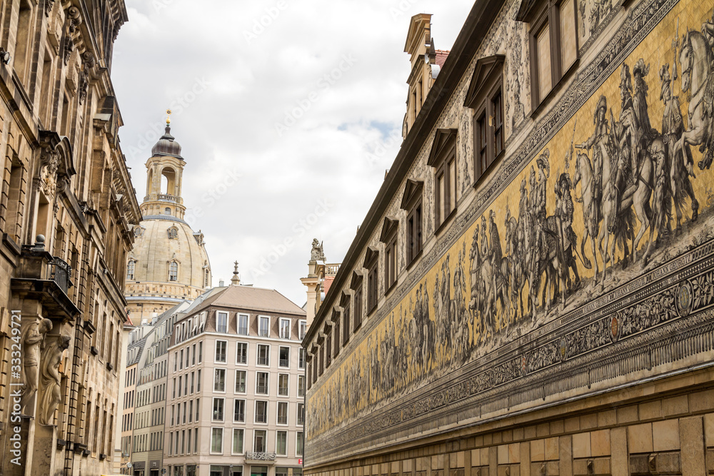 Dresden, Saxony / Germany - July 11, 2019: Furstenzug giant mural decorates mosaic on the wall of Augustus Street in Dresden, Germany