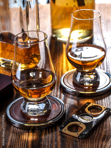 Two glencairn glasses of whisky