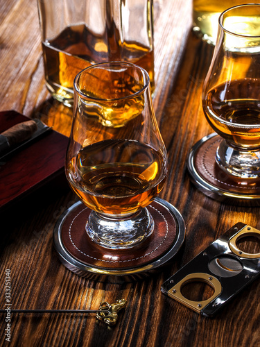 Two glencairn glasses of whisky