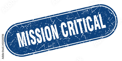 mission critical sign. mission critical grunge blue stamp. Label