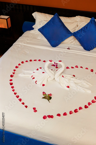 Bedroom decoration, decorated with towel and flower