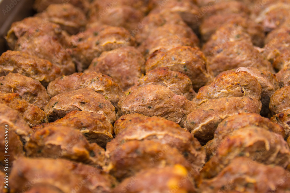 Close up of fried meatballs with herbs