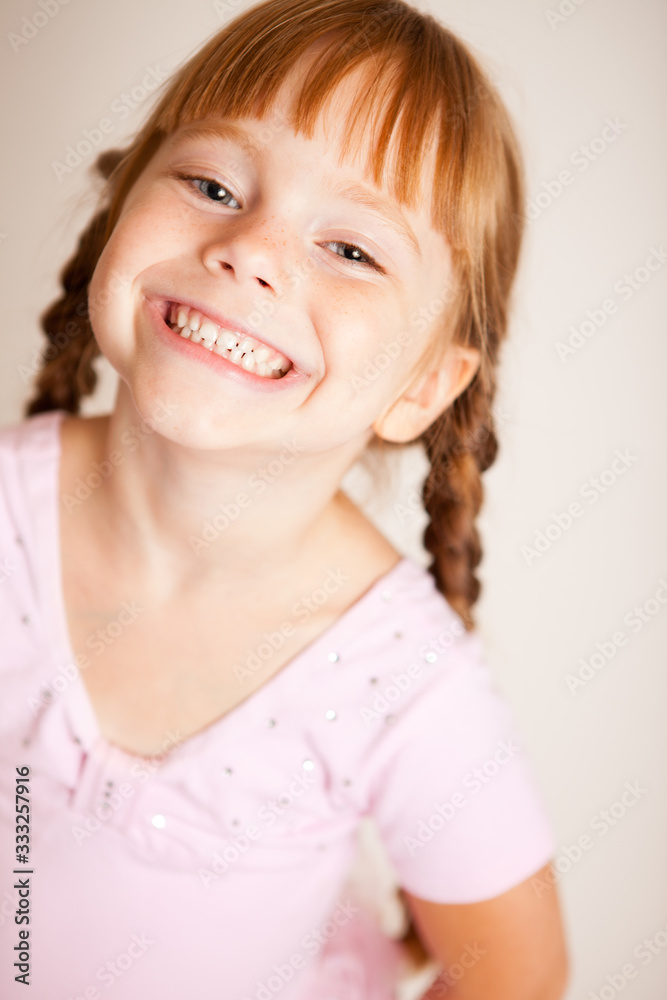 Smiling Red Haired Girl with Braids Smiling Red Haired Girl with Braids