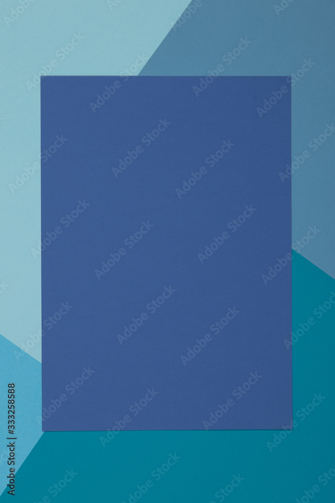 Blue background, colored paper geometrically divides into zones, frame, copy, space. Blue background, colored paper geometrically divides into zones, frame, copy, space.