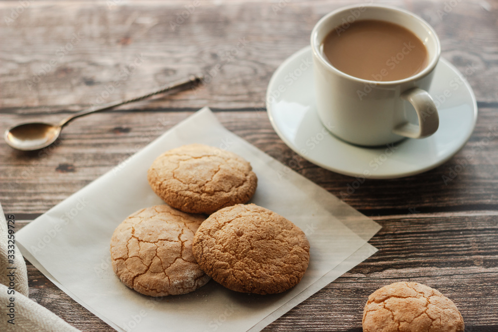 Almond cookies on the wood table. Romantic composition Almond cookies on the wood table. Romantic composition