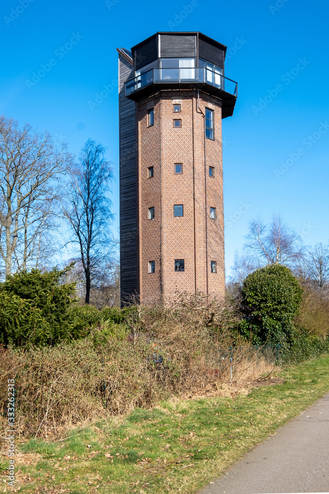 A very old water tower converted into a residential dwelling