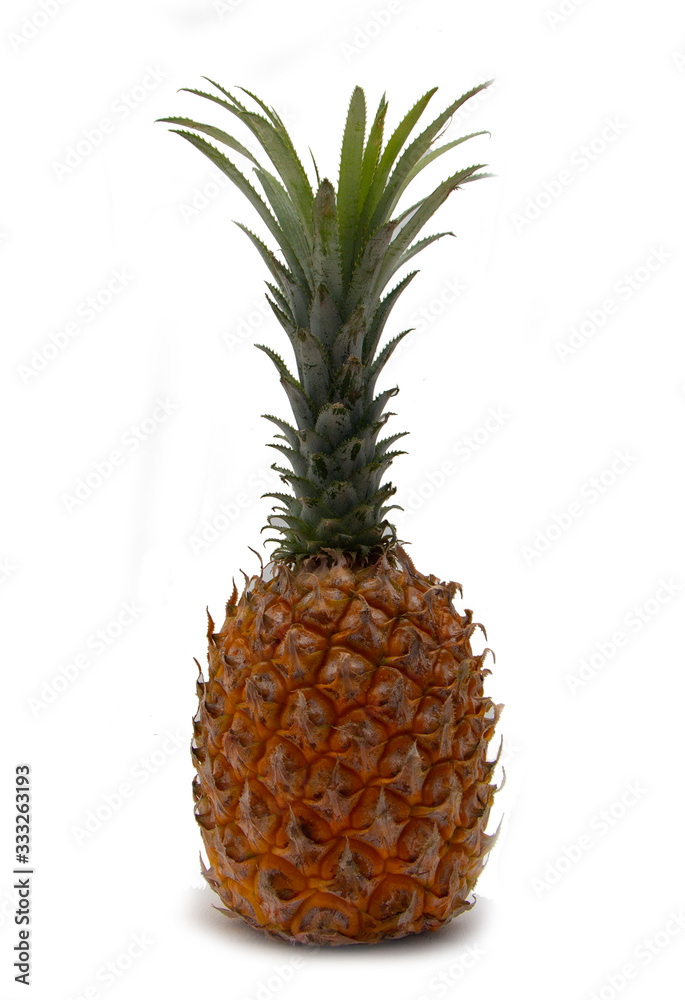 ripe pineapple on a white background with a shadow ripe pineapple on a white background with a shadow