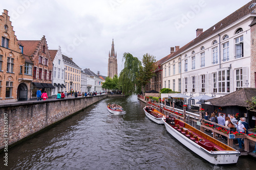 Beautiful medieval city of Bruges in Belgium (Europe). Full of bridges and water channels, surrounded by fantastic buildings.