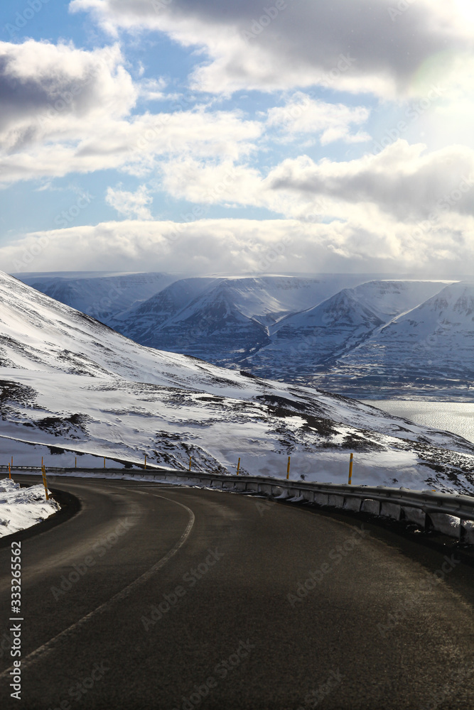 asphalt road and mountains with nature landscape in Iceland