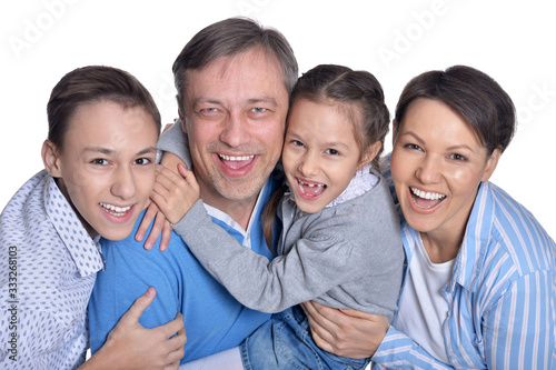 Portrait of happy smiling family posing together
