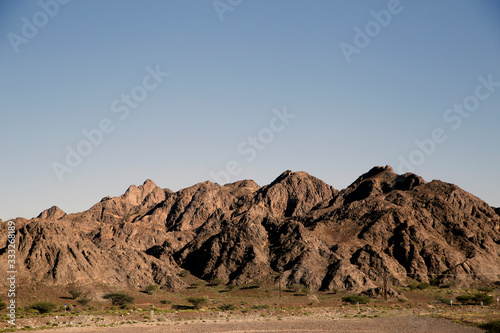 Ophiolite mountains along the Oman highway  photo
