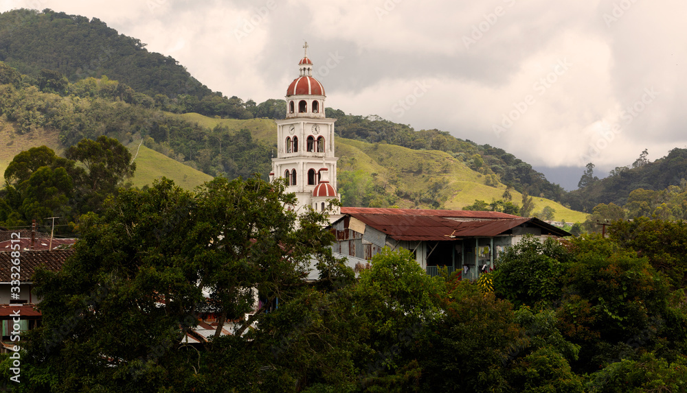 Photograph of traditional Colombian church in the middle of mountains