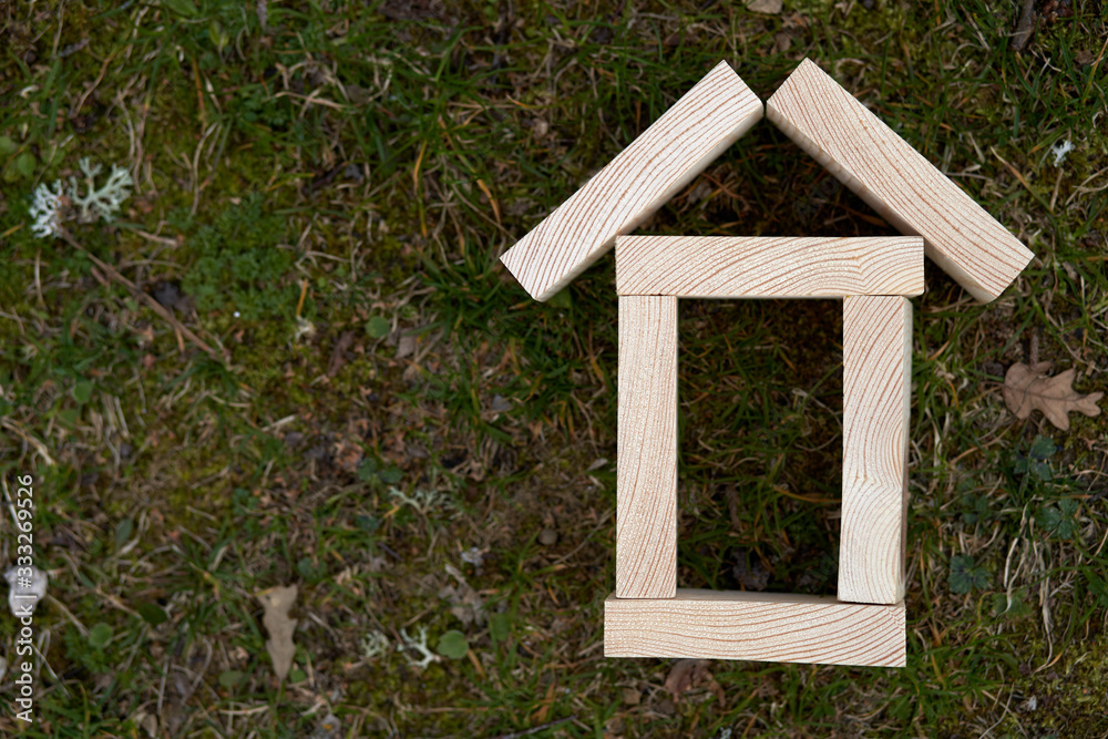 Wooden blocks in a shape of a house can be used as copy space or use for concepts Wooden blocks in a shape of a house can be used as copy space or use for concepts