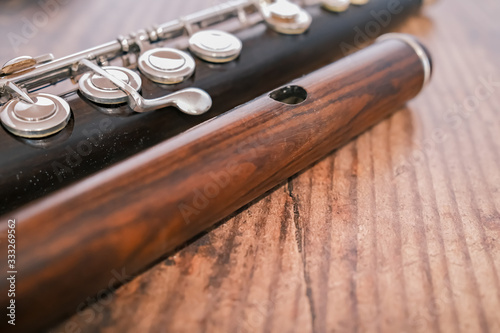  Classic wooden flute on a hardwood background