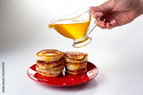 Honey syrup on pancake, del...
