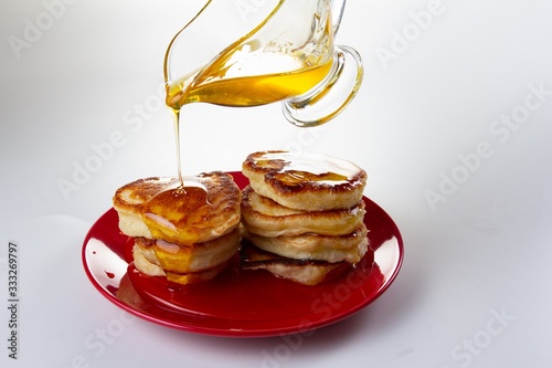 Honey syrup on pancake, del...