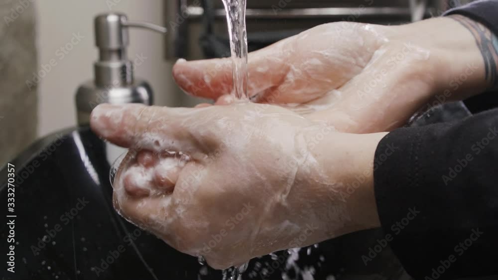 Washing hands with soap and hand sanitizer gel to prevent coronavirus pandemic. Antibacterial, prevention, epidemic, slow motion, bathroom, virus, infection / 4K Slow Motion Footage Washing hands with soap and hand sanitizer gel to prevent coronavirus pandemic. Antibacterial, prevention, epidemic, slow motion, bathroom, virus, infection / 4K Slow Motion Footage