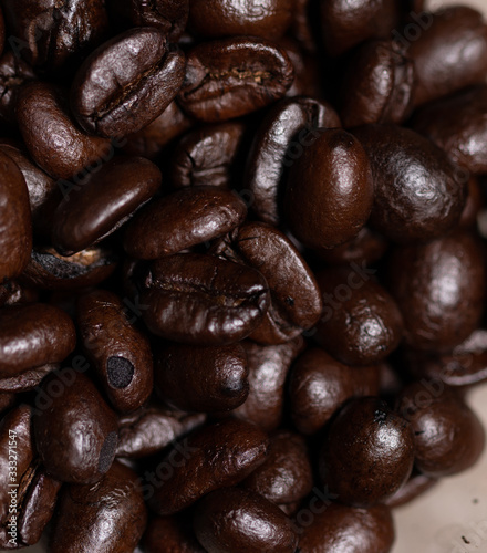 Fototapeta Naklejka Na Ścianę i Meble -  Roasted Coffee beans in Macro picture
