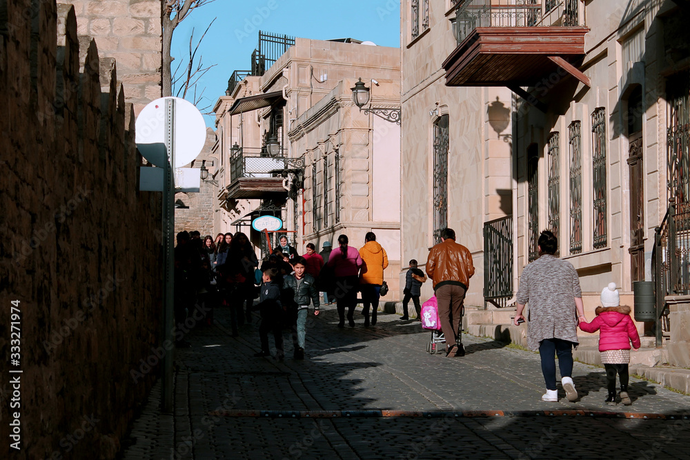 people walking in old city